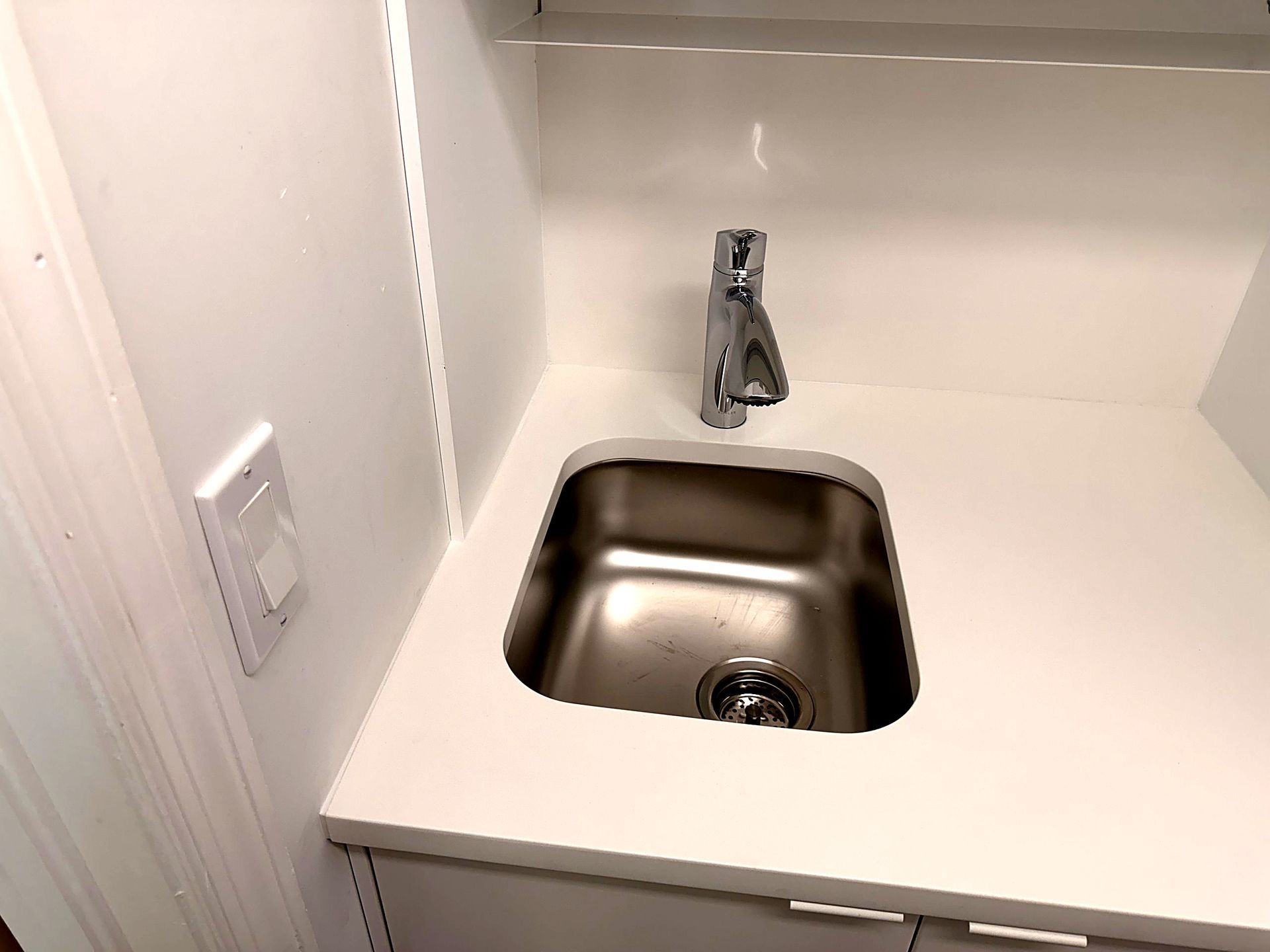 Laundry counter with undermount sink
