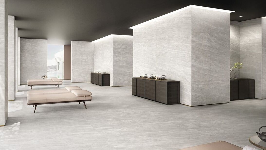 a large room with a lot of white walls and a lot of furniture