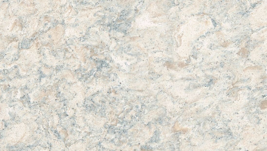 a close up of a white granite counter top .