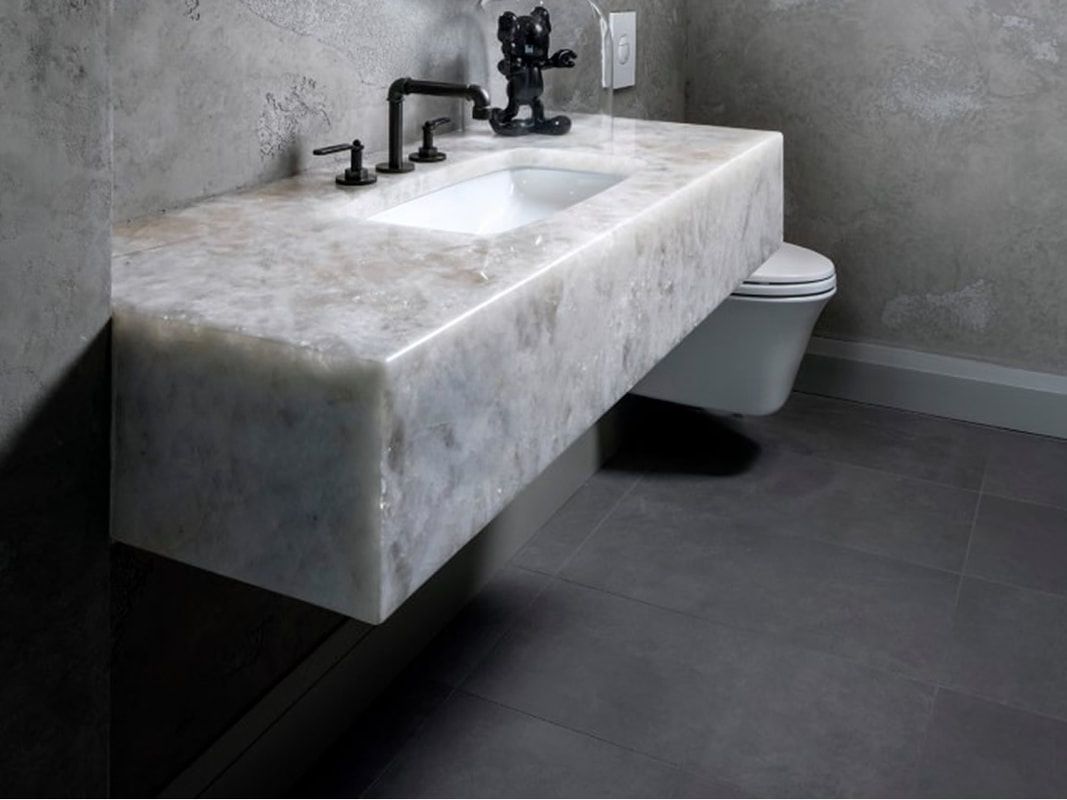 a bathroom with a sink and a toilet