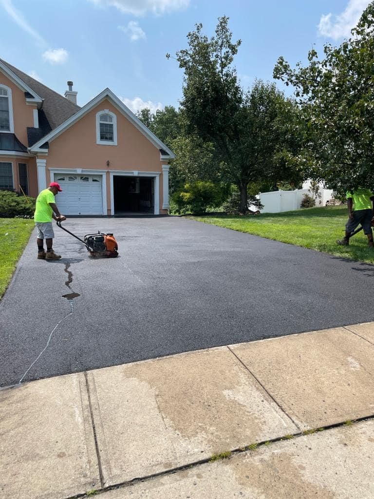 Working on asphalt driveway