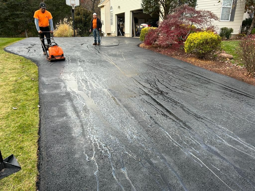 New asphalt driveway at work