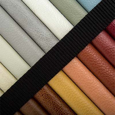 Rows of colorful leather swatches with a black strap diagonally across them.