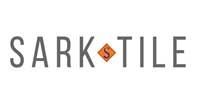 SARK TILE logo in gray text with a brown and orange diamond-shaped emblem with the letter 