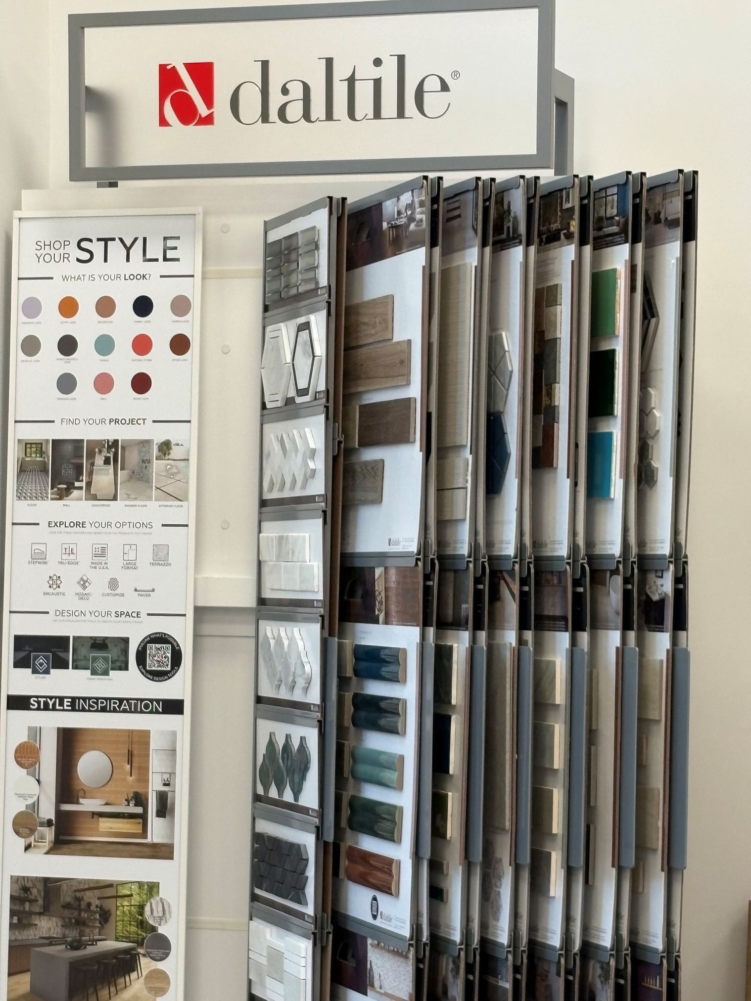 Daltile showroom display with tile sample boards and design brochures