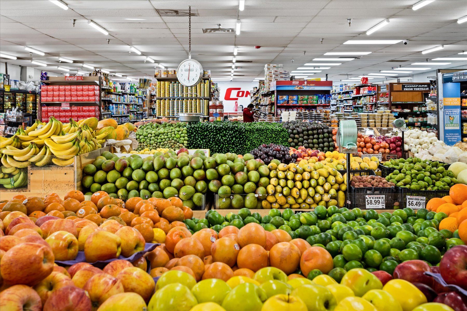 A grocery store filled with lots of fruits and vegetables.