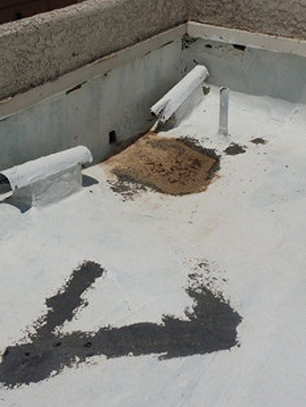 Broken flat roof and roofing materials