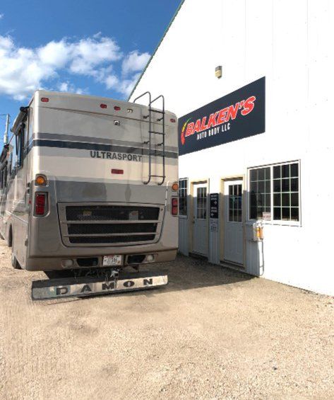 RV in front of the auto shop