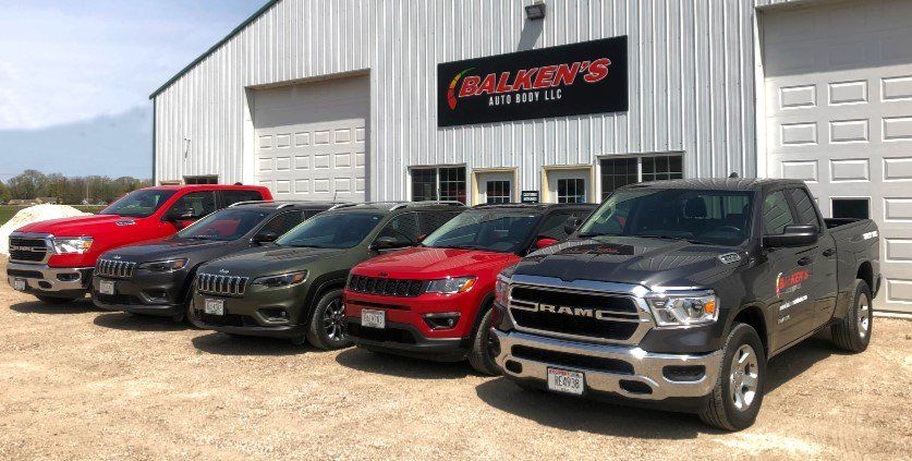 Cars in front of auto shop