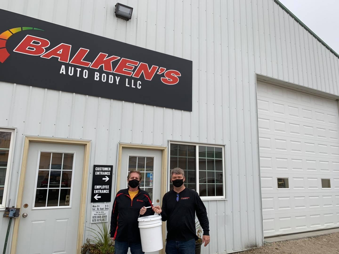 In front of Balken's shop