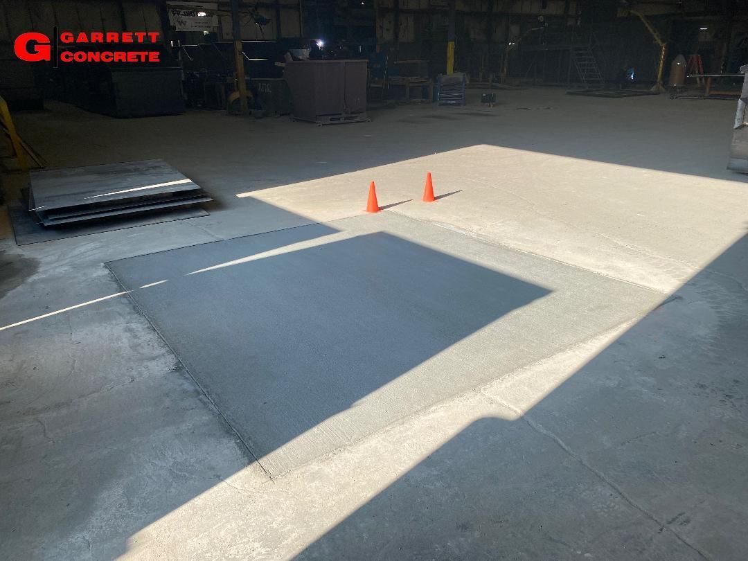 a warehouse with concrete floor