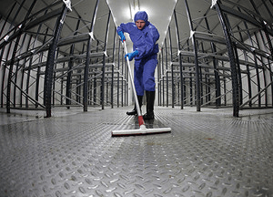 cleaning floor in empty storehouse