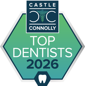 Castle Connolly Top Dentists 2026 badge in teal and blue with a white tooth icon