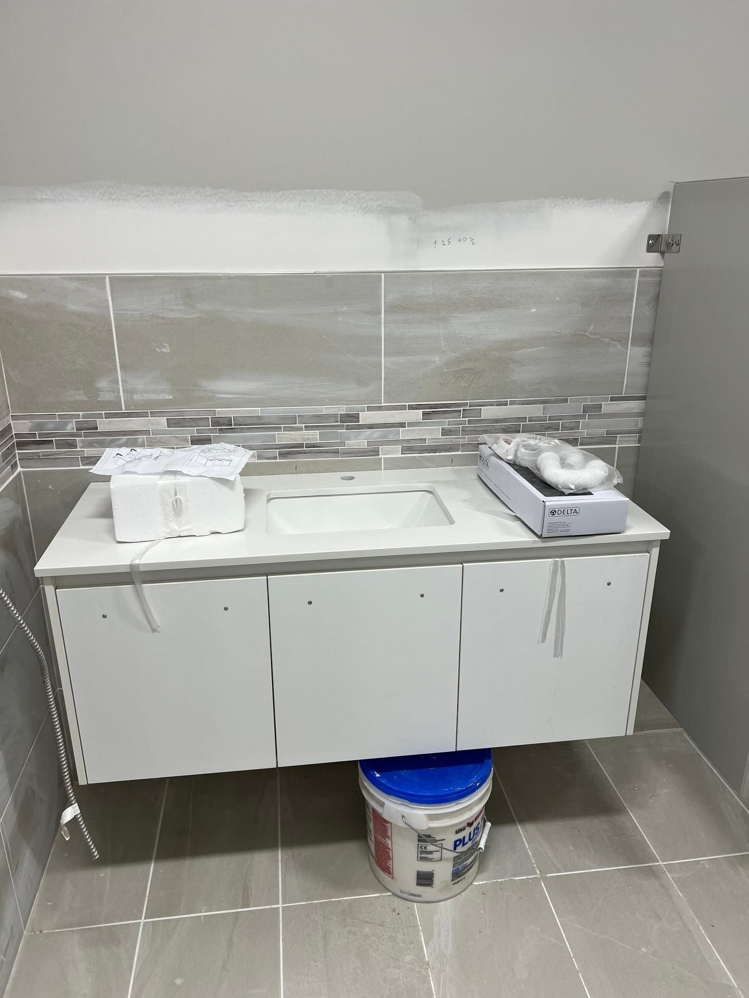 white bathroom vanity on bucket