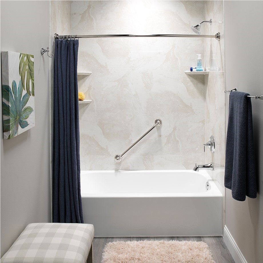 Accessible bathroom with walk-in shower, white tub, gray floor, and sink on the right
