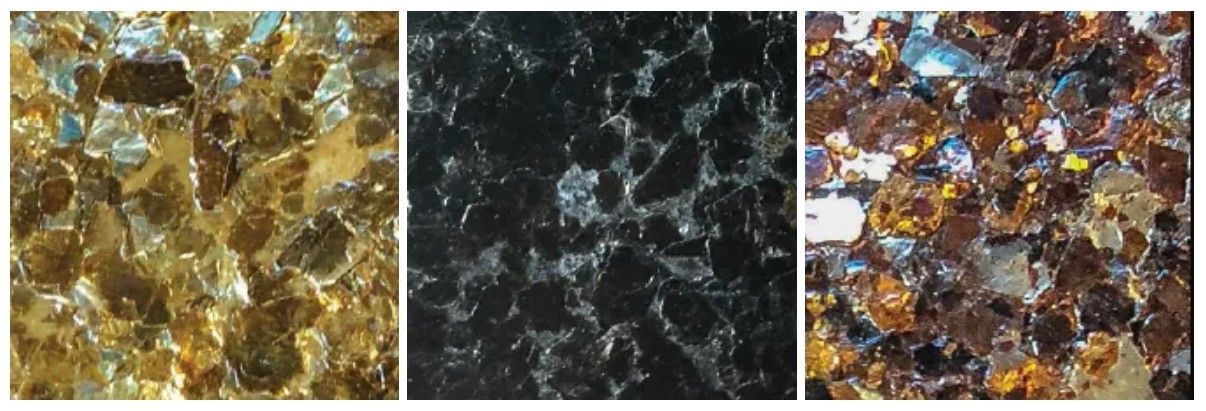 Three different colored tiles with different patterns on them