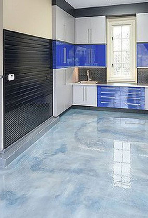 A kitchen with blue cabinets and a blue metallic floor.