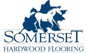 Somerset Hardwood Flooring logo: white horse silhouette inside a dark blue leaf shape, with text 