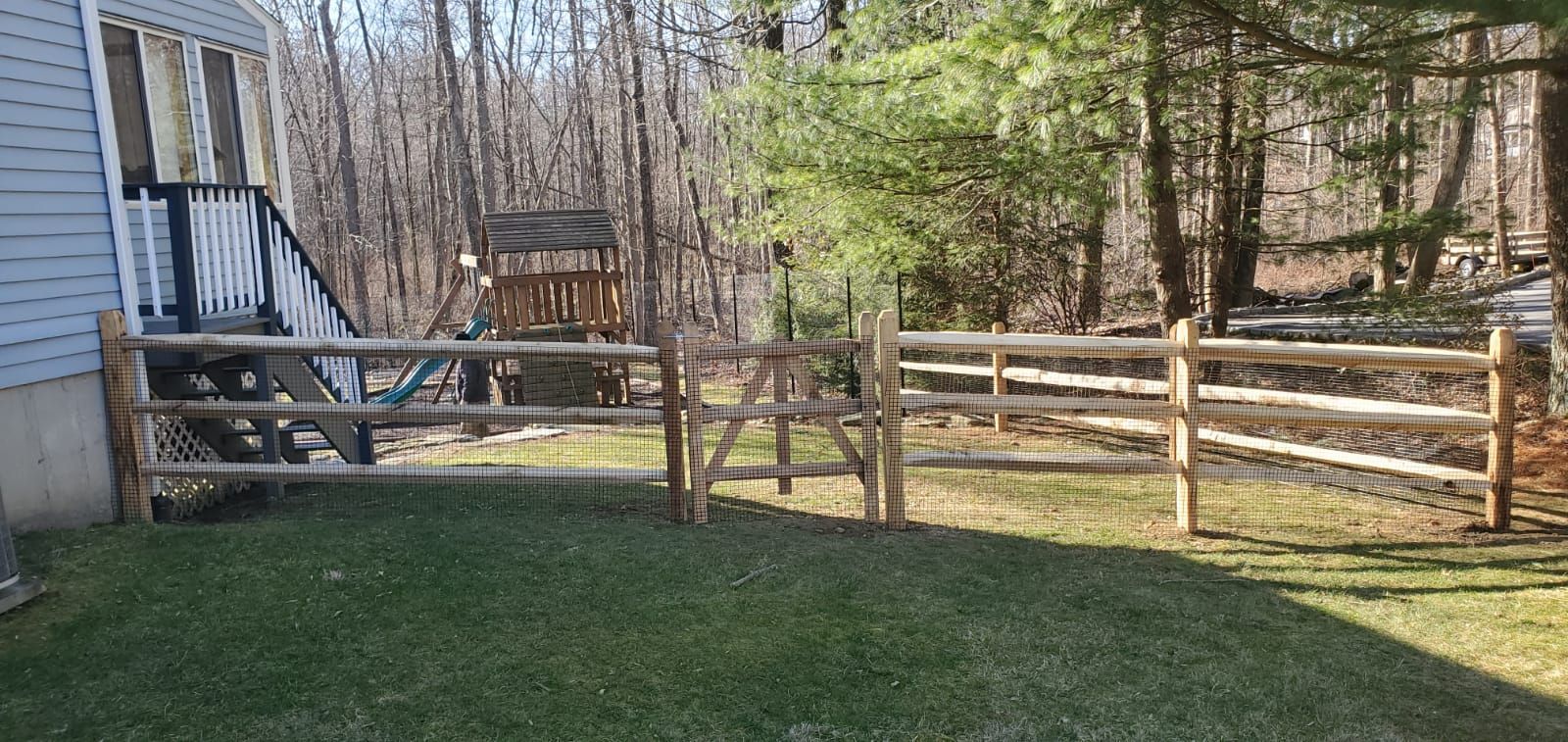 A wood split rail fence