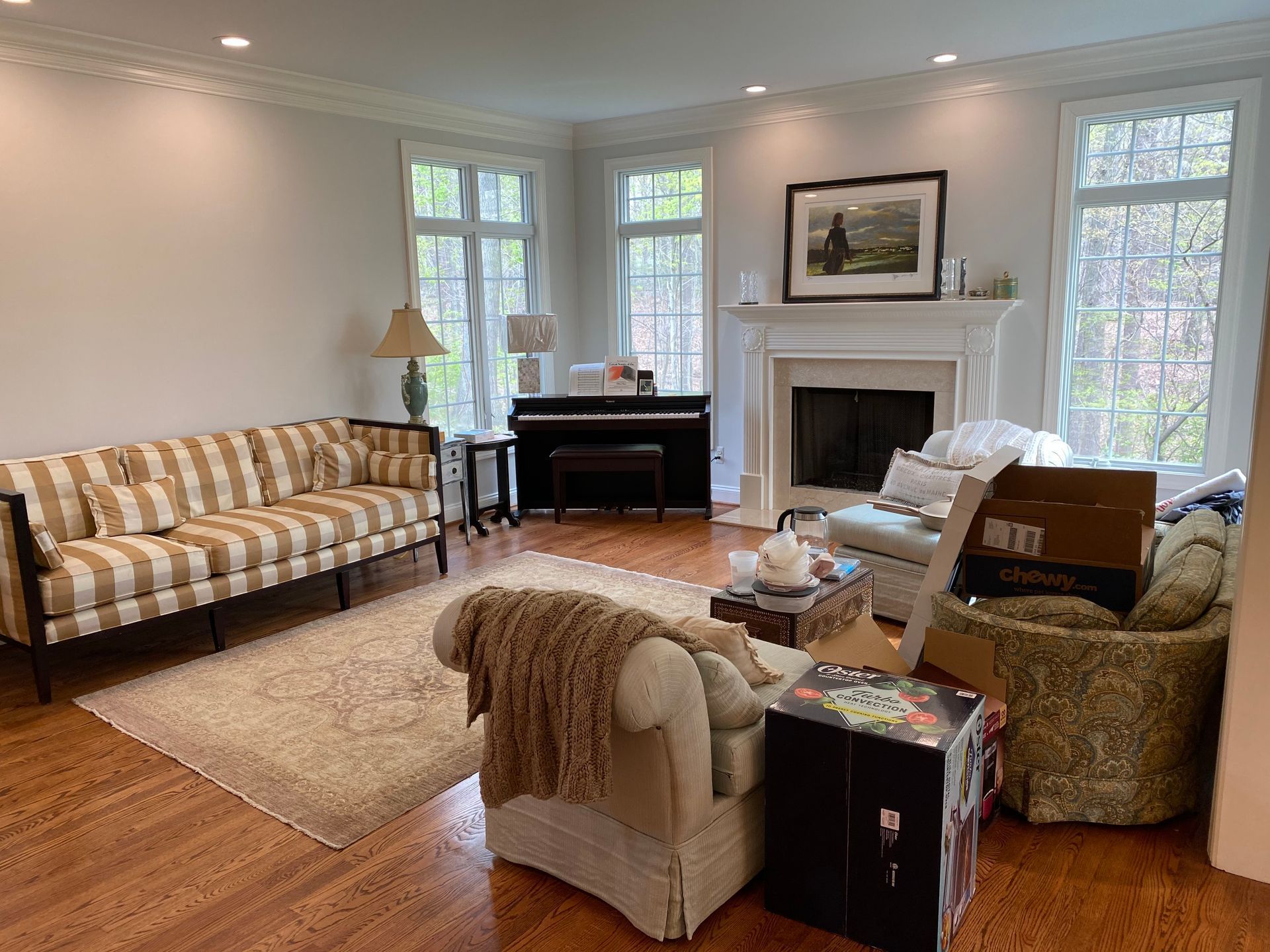 A living room filled with furniture and a fireplace.