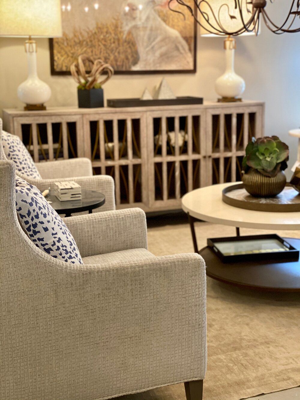 A living room with two chairs and a coffee table