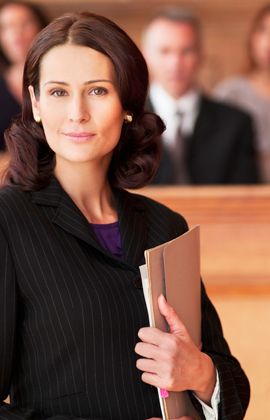 A woman lawyer holding a folder