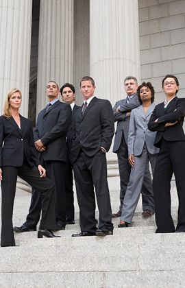Lawyers standing in front of a courthouse