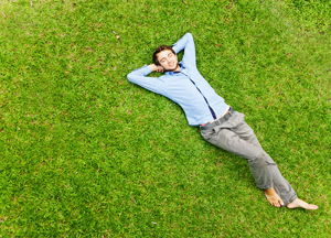 Man sleeping on a grass
