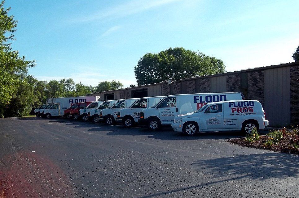 Flood Pros services trucks