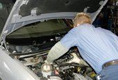 Mechanic working in auto repair service