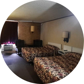 learn more about Accommodations Cheyenne Motel room with 2 double beds