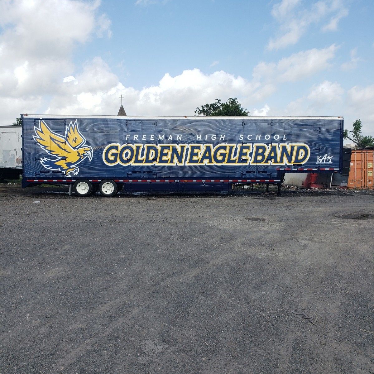 Blue trailer for the Freeman High School Golden Eagle Band with a golden eagle graphic.
