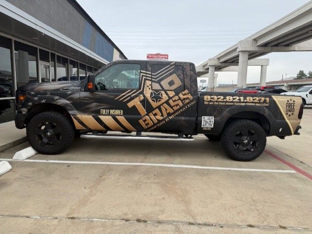Black and gold pickup truck with 