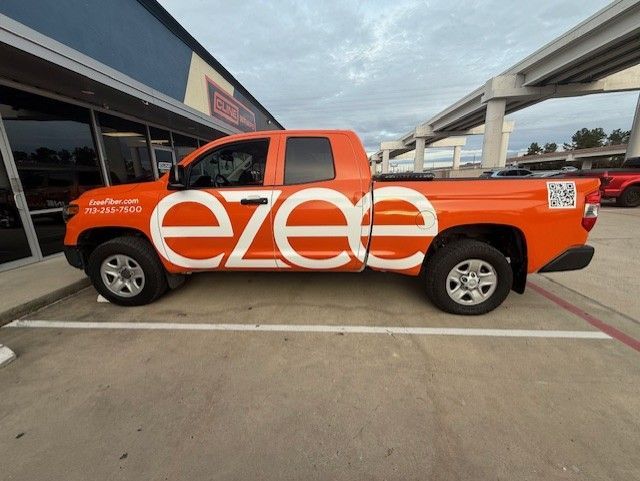Orange Toyota truck with 