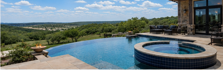 Infinity pool with hot tub overlooking a scenic green valley under a blue sky