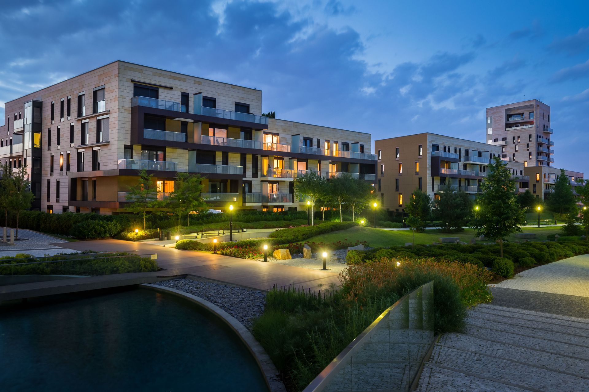 garden with lights in front of a building