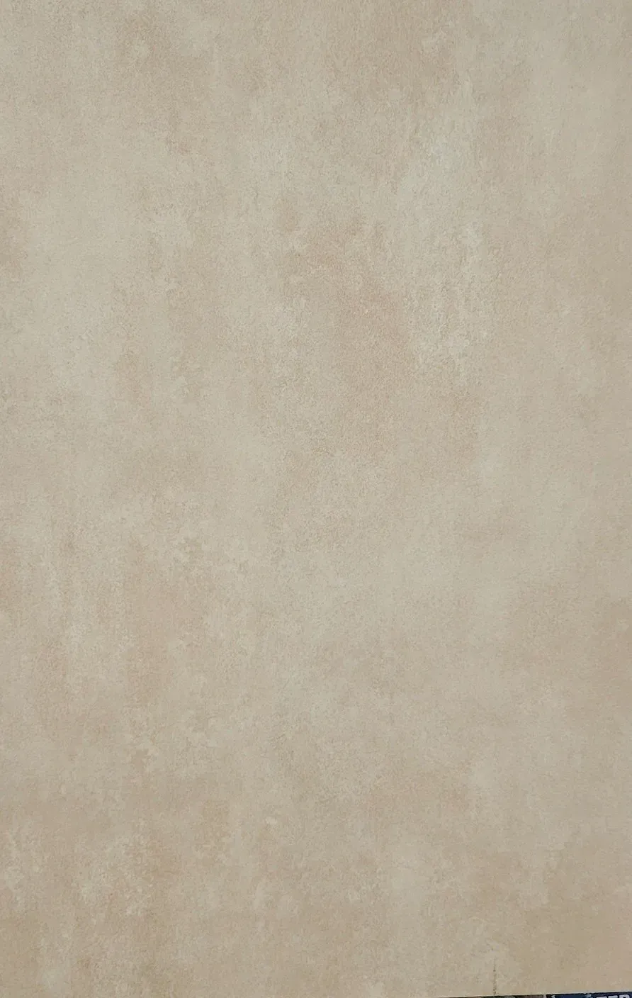 Plain beige textured wall background