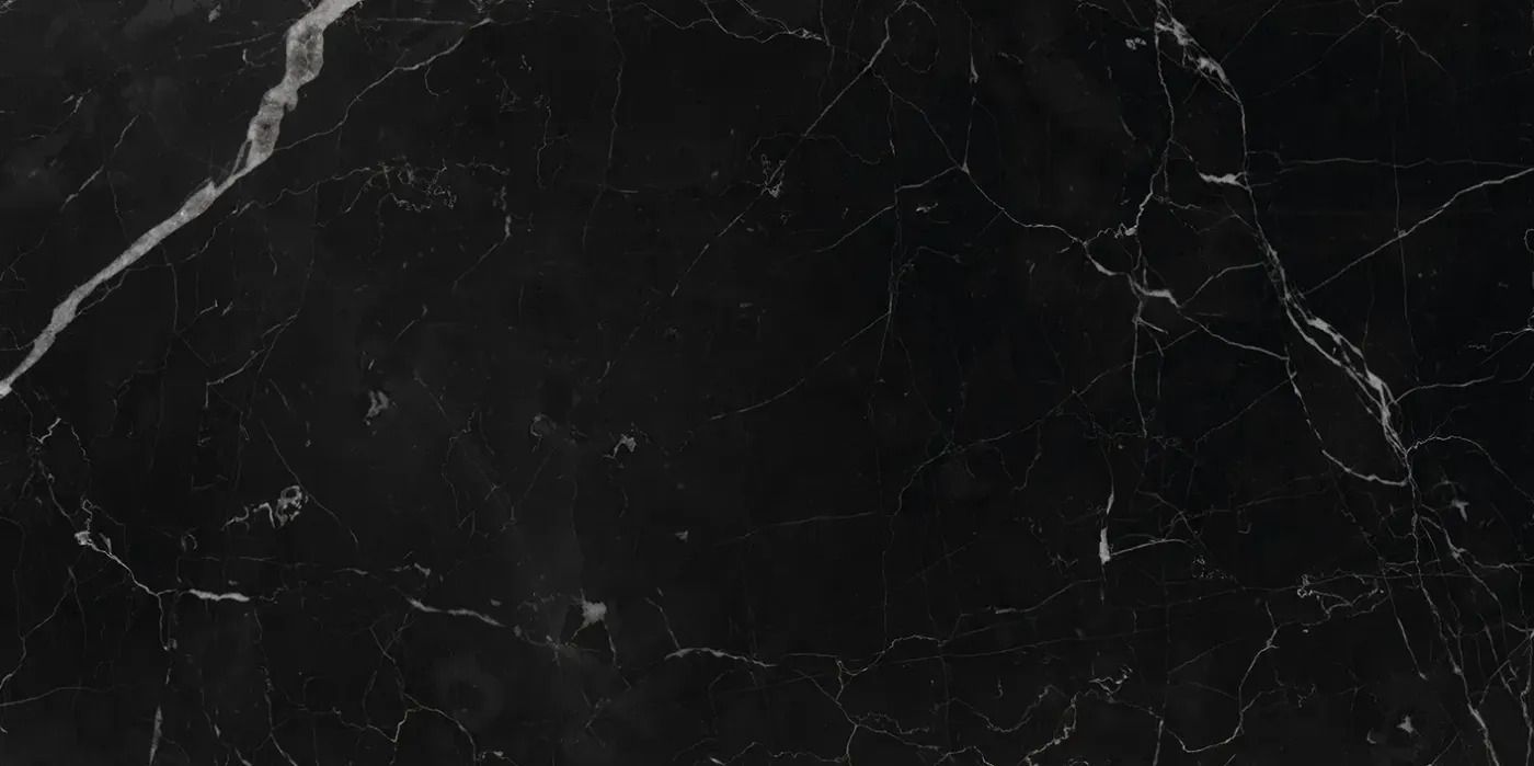 Black marble texture with thin white veins throughout