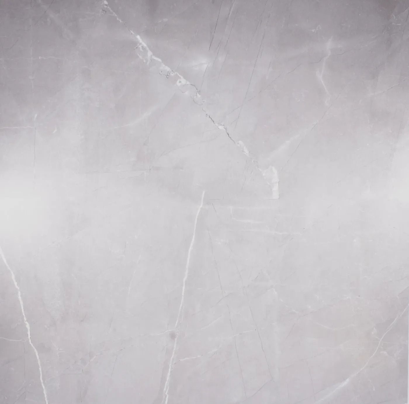 Light gray marble or concrete surface with faint white veining and a central crack.