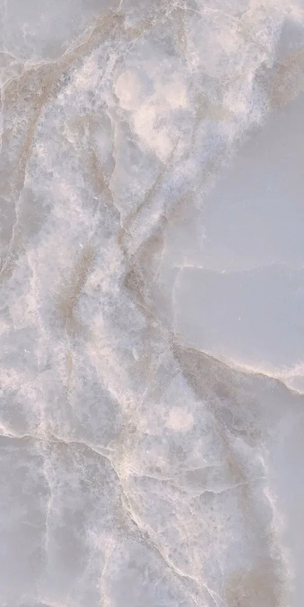Close-up of a pale gray and white marbled stone surface with subtle veining
