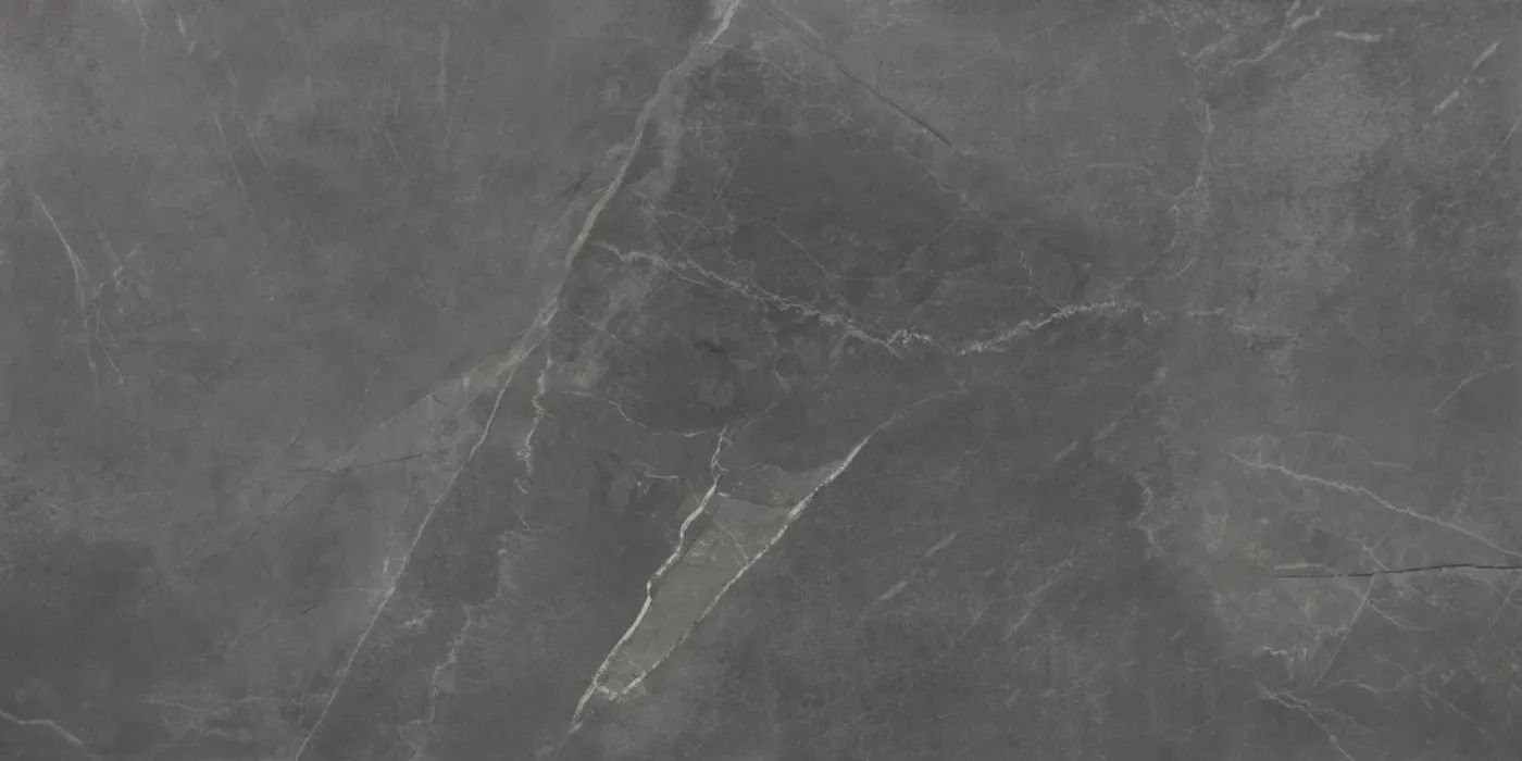 Dark gray marble surface with subtle white veins and texture