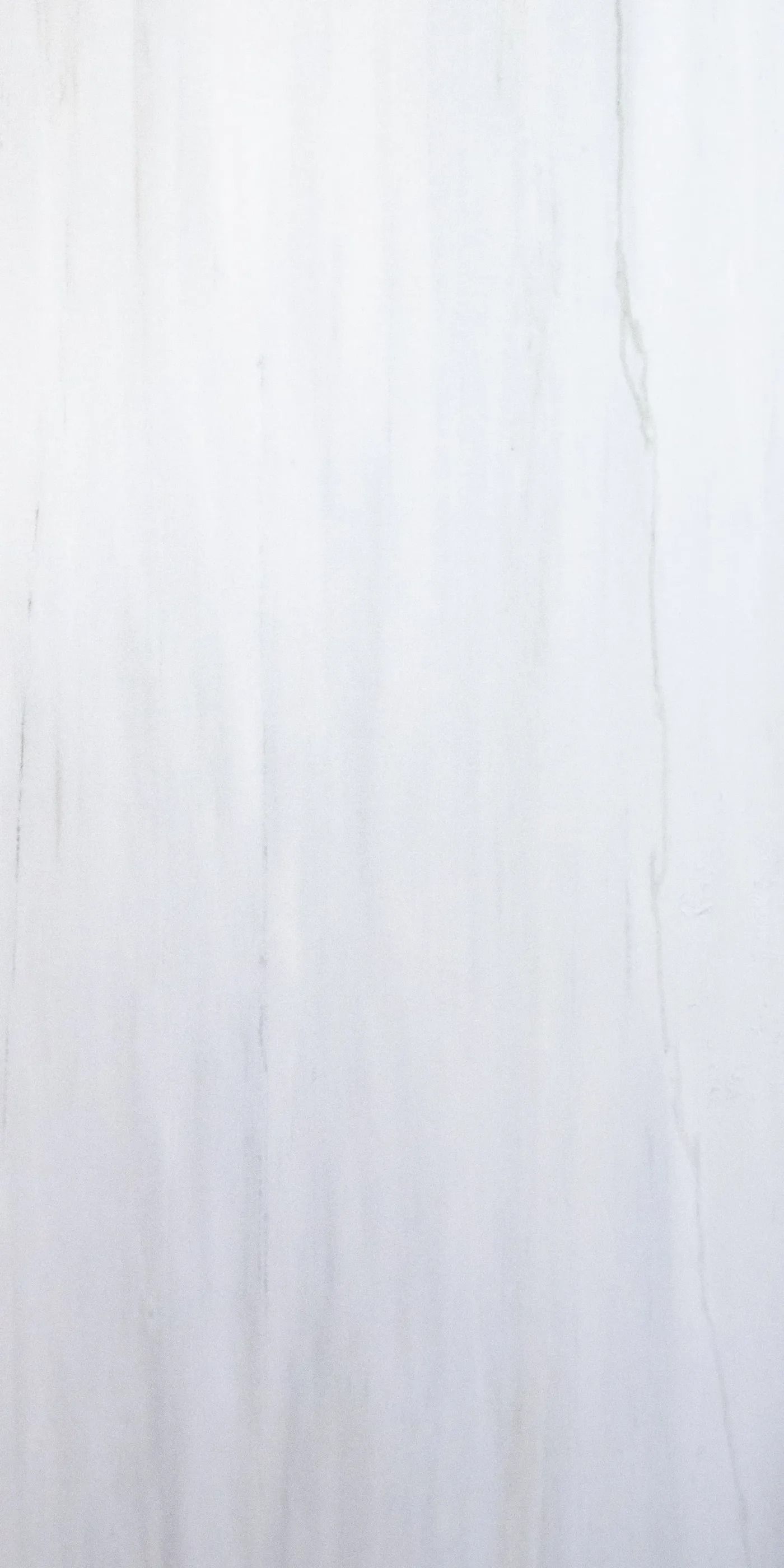 Plain white textured surface with faint vertical gray streaks