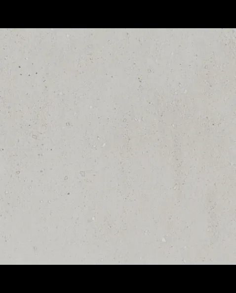Light beige textured wall with subtle speckles and a small dark spot
