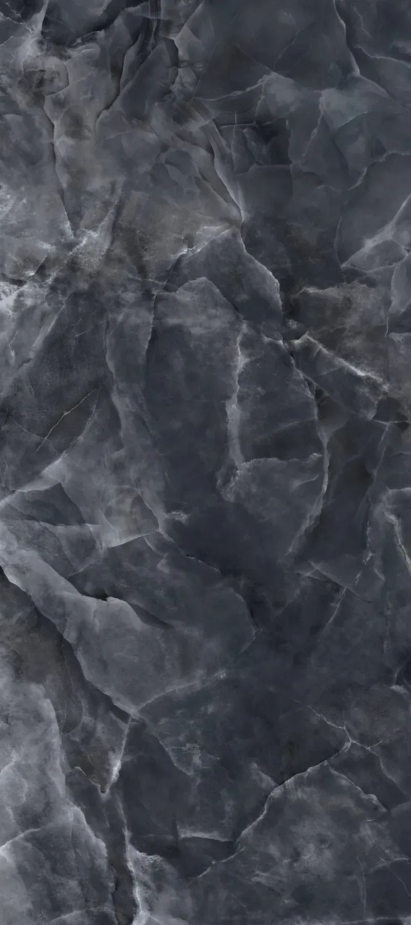 Dark gray marbled stone texture with white veining