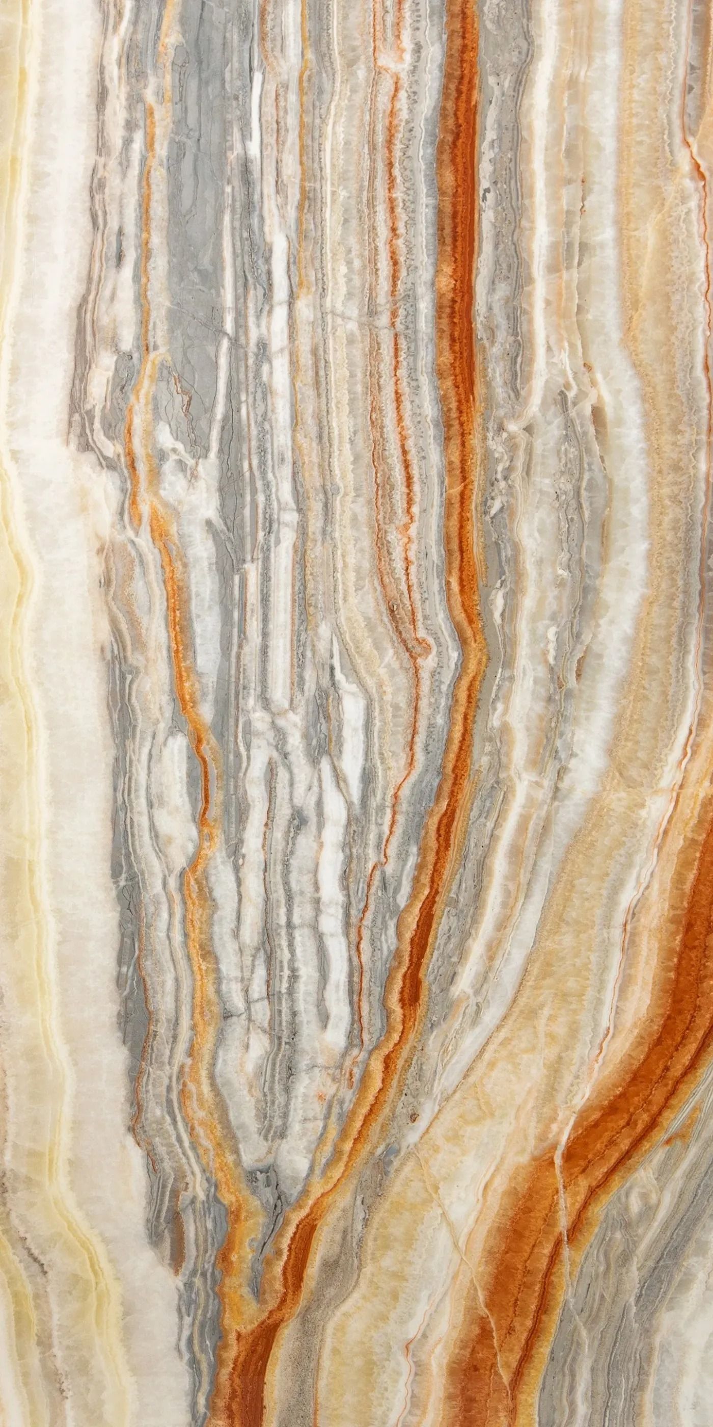 Vertically banded beige, gray, and orange marble or stone texture