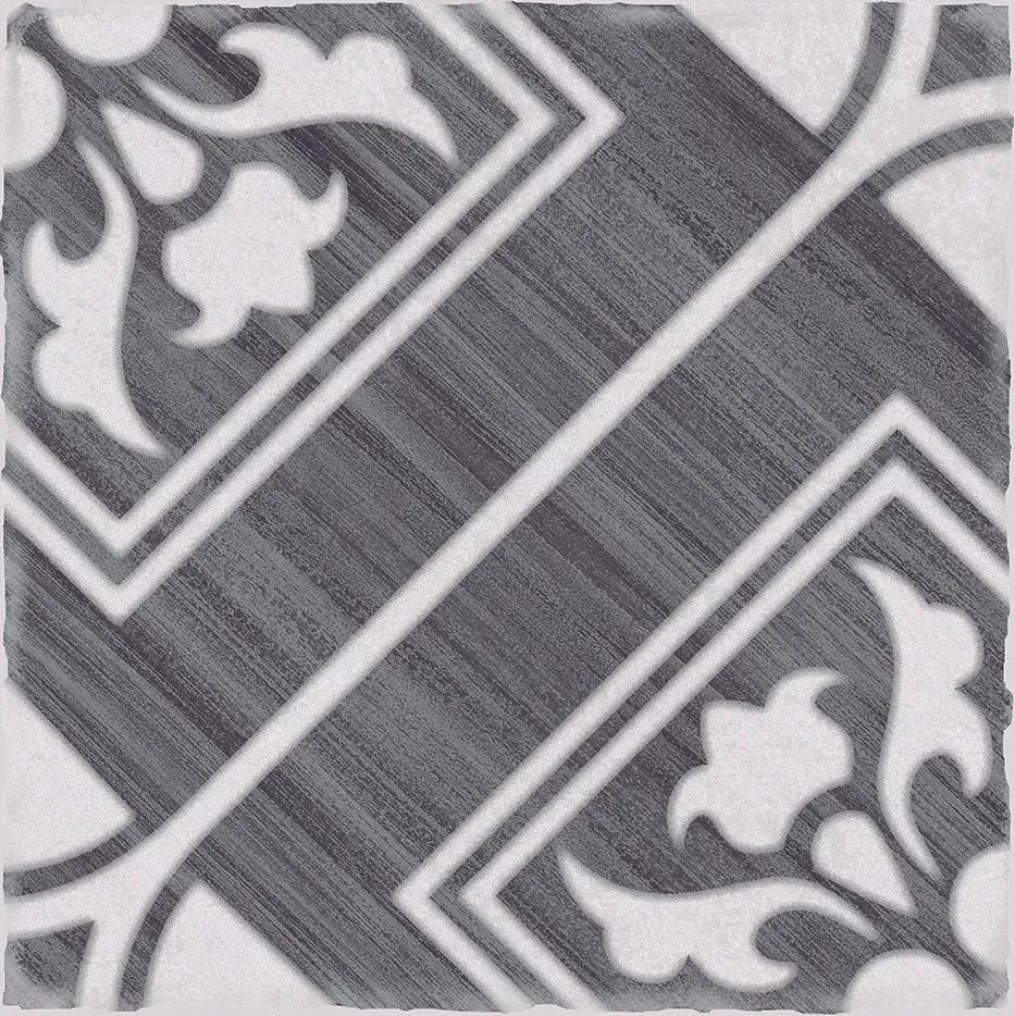 Black-and-white diagonal patterned fabric with ornate floral motifs and striped borders