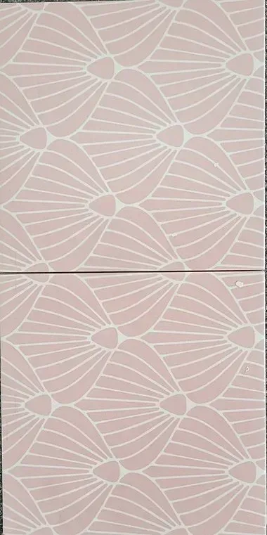 Pink leaf-patterned wallpaper or fabric with thin white outlines and a horizontal seam in the middle