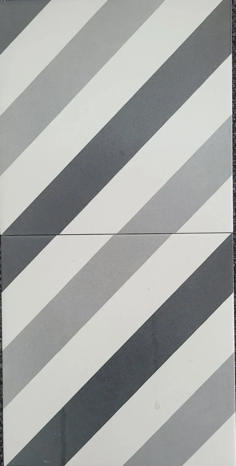 Gray and white diagonal striped pattern with a horizontal seam across the middle