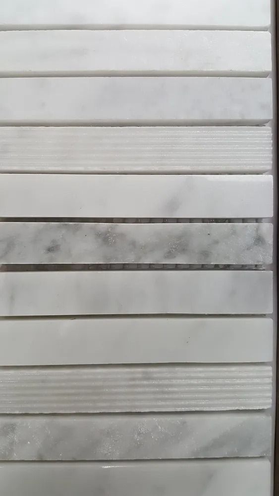 White horizontal paneling with a dark, stained strip across the middle
