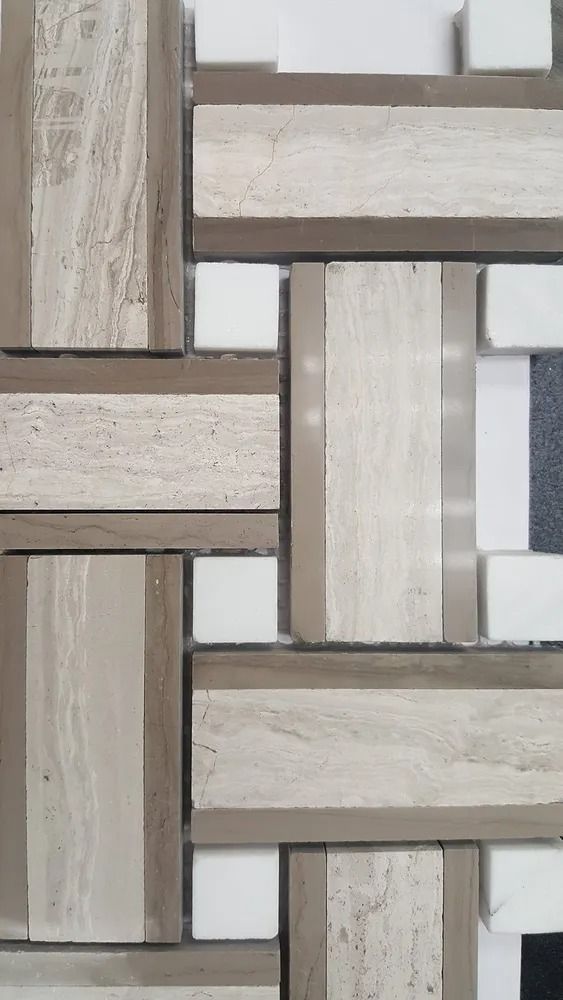Beige and white woven tile pattern with wood-like textures, viewed up close.